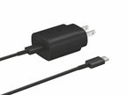 Matte black USB-C wall adapter connected to black cable displayed against plain white background showing metal prongs.