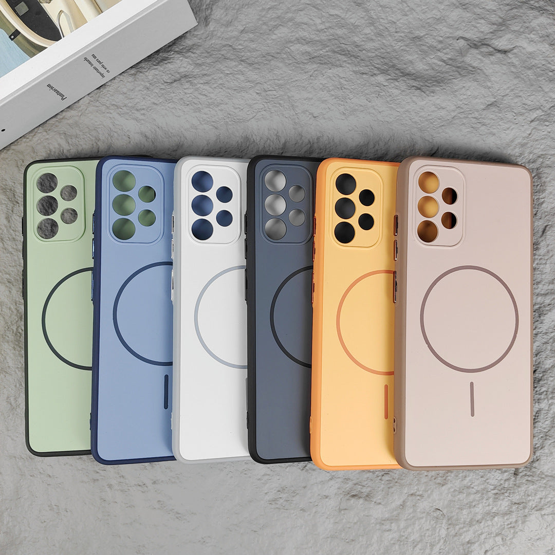 Fanned mint green and blue cases showing circular magnetic rings and camera cutouts on stone